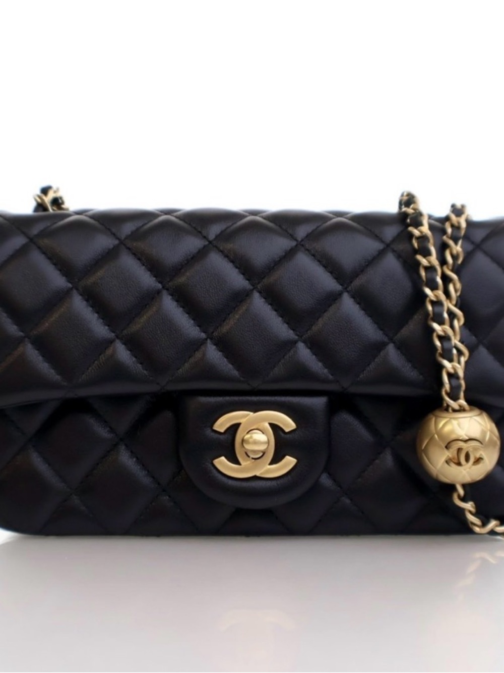 CHANEL Black Quilted Shoulder Bag with Gold Hardware